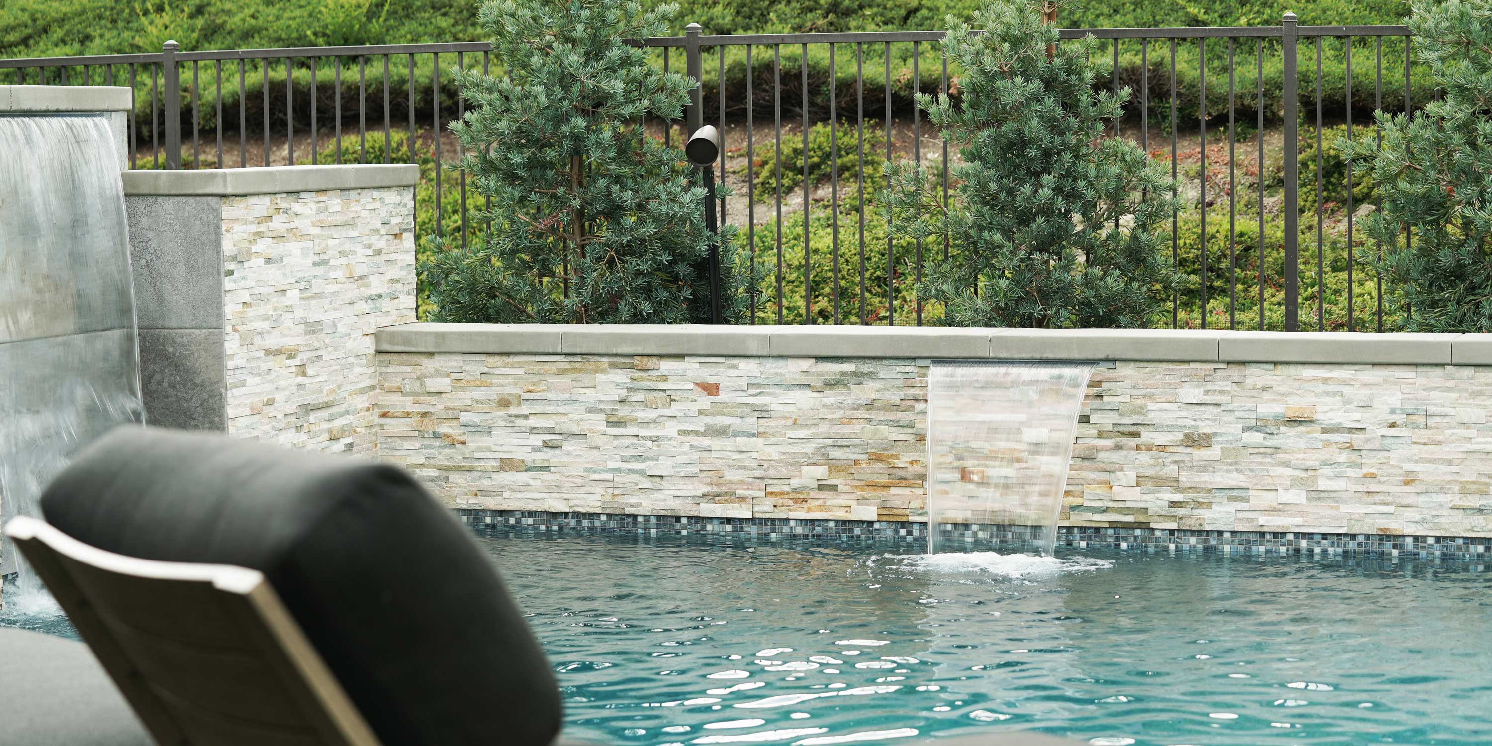 sonance technology on an image of water features by a pool