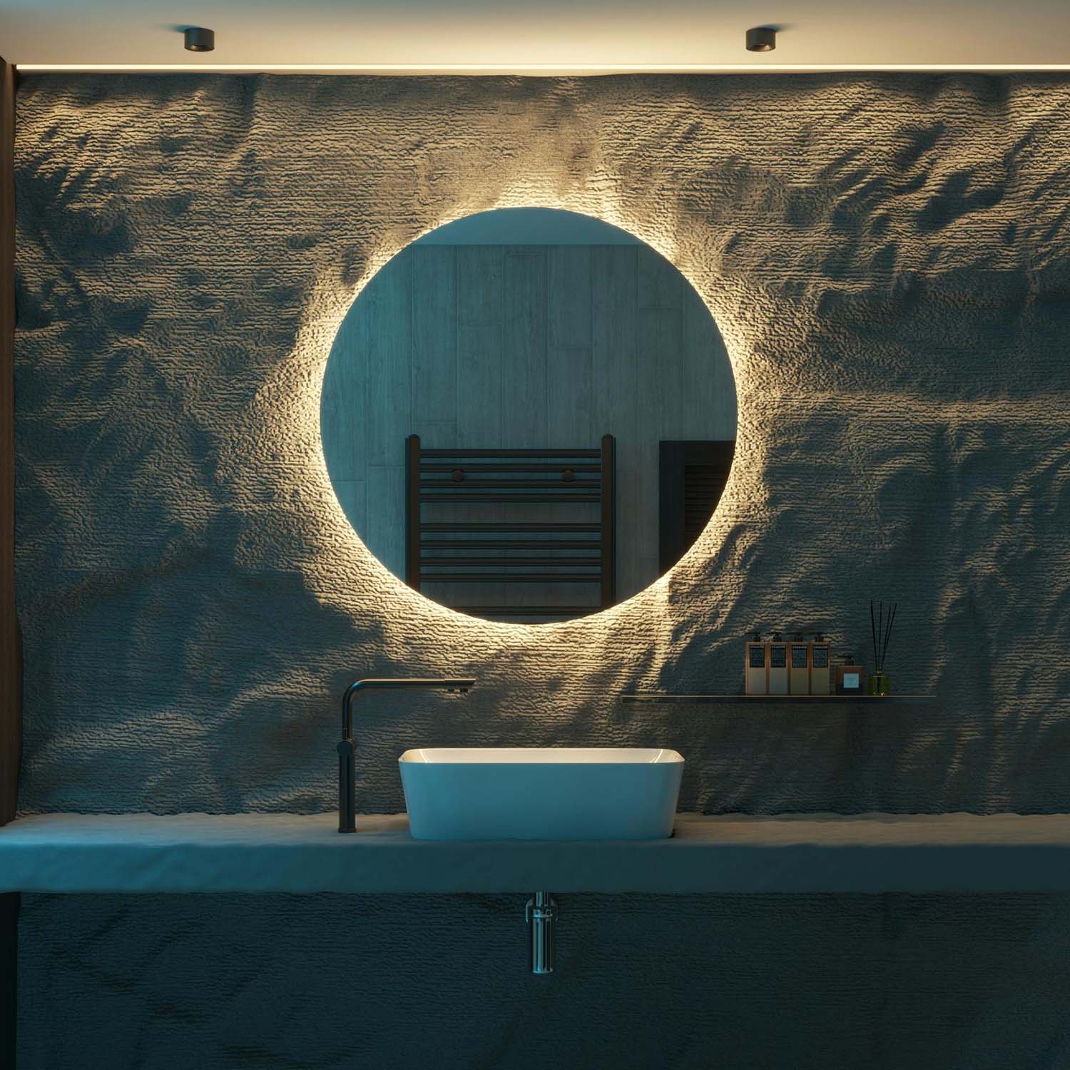 grey stone bathroom wall with circular mirror